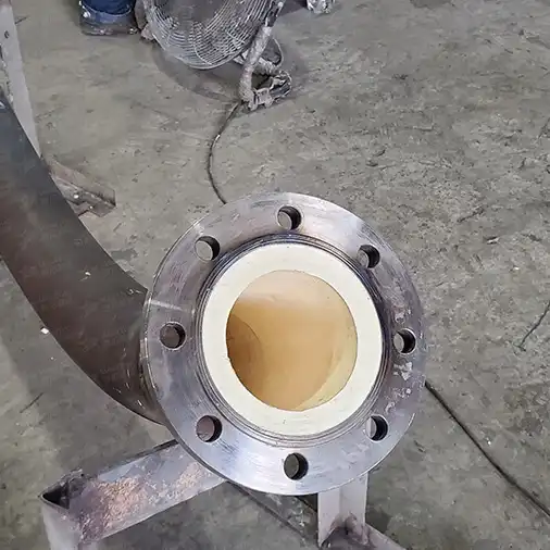 耐磨陶瓷弯头在粉体输送系统中的应用及安装技术要点